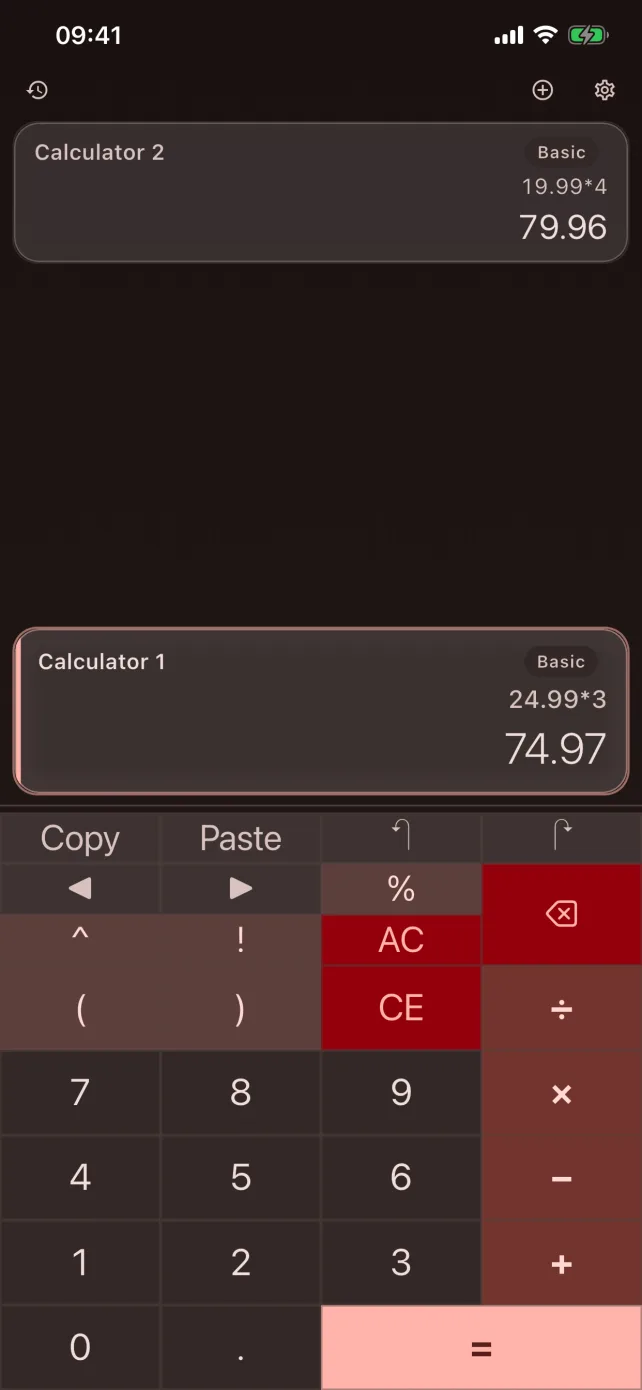 CalcBoard on iPhone running two calculator panels at once in the dark Coral theme
